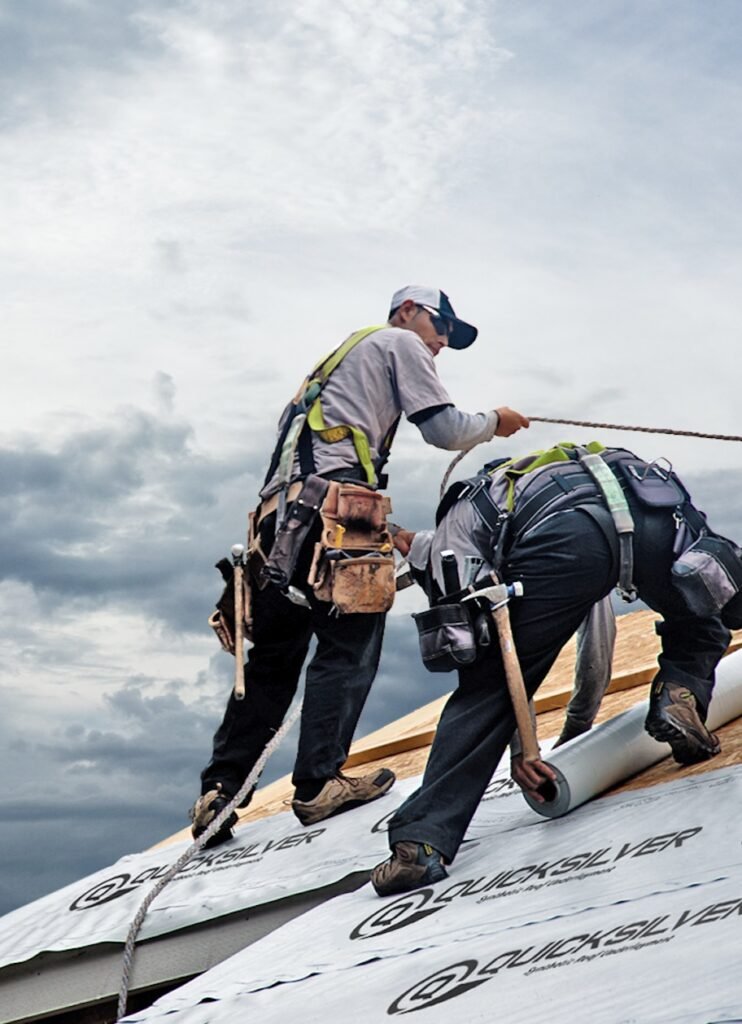 man working on a roof